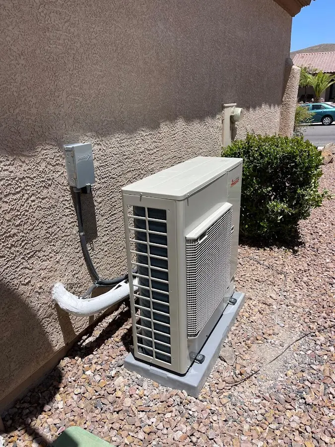 Residential air conditioning condenser unit in Palmer